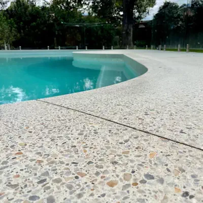 Honed concrete pool area in Perth